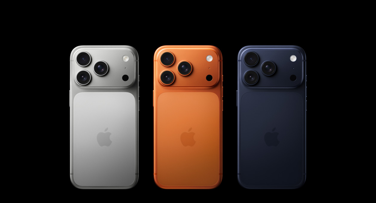 iPhone 17 Pro, back exterior, all three finishes, Silver, Cosmic Orange, Deep Blue, Pro Fusion camera system in top left corner, 3 lenses, microphone, flash, Apple logo in centre